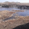 В Зиме восстановлена размытая во время таяния снега дамба на реке Ухтуйка